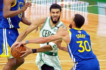 Jun 16, 2022; Boston, Massachusetts, USA; Boston Celtics forward Jayson Tatum (0) drives to the basket against Golden State Warriors guard Stephen Curry (30) during the third quarter in game six of the 2022 NBA Finals at TD Garden. Mandatory Credit: Kyle Terada-USA TODAY Sports