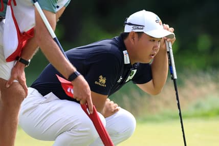 Jun 17, 2022; Brookline, Massachusetts, USA; Joohyung Kim lines up a putt during the second round of the U.S. Open golf tournament. Mandatory Credit: Aaron Doster-USA TODAY Sports