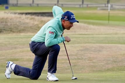 Jul 14, 2022; St. Andrews, SCT; Padraig Harrington lines up a putt on the 17th green during the first round of the 150th Open Championship golf tournament at St. Andrews Old Course. Mandatory Credit: Michael Madrid-USA TODAY Sports