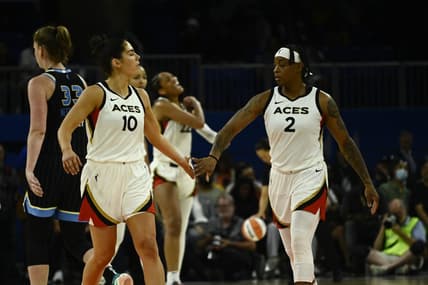 Jul 26, 2022; Chicago, IL, USA;  Las Vegas Aces guard Kelsey Plum (10) and Las Vegas Aces guard Riquna Williams (2) high five against the Chicago Sky during the second half of the Commissioners Cup-Championships at Wintrust Arena. Mandatory Credit: Matt Marton-USA TODAY Sports