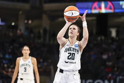 Jul 29, 2022; Chicago, Illinois, USA; New York Liberty guard Sabrina Ionescu (20) shoots a free throw against the Chicago Sky during the second half of the WNBA game at Wintrust Arena. Mandatory Credit: Kamil Krzaczynski-USA TODAY Sports