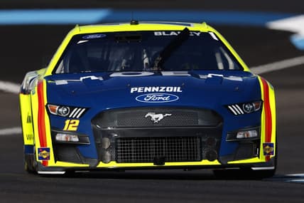 Jul 30, 2022; Speedway, Indiana, USA; NASCAR Cup Series driver Ryan Blaney (12) during practice at Indianapolis Motor Speedway Road Course. Mandatory Credit: Mike Dinovo-USA TODAY Sports