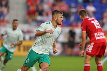 Aug 2, 2022; Harrison, New Jersey, USA; Colorado Rapids forward Diego Rubio (11) celebrates his goal in front of New York Red Bulls defender Sean Nealis (15) during the first half at Red Bull Arena. Mandatory Credit: Vincent Carchietta-USA TODAY Sports