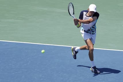 Aug 3, 2022; Washington, DC, USA; Emil Ruusuvuori (FIN) hits a backhand against Hubert Hurkacz (POL) (not pictured) on day three of the Citi Open at Rock Creek Park Tennis Center. Mandatory Credit: Geoff Burke-USA TODAY Sports