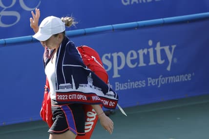 Aug 3, 2022; Washington, DC, USA; Simona Halep (ROU) waves to the crowd while leaving the court after retiring from her match against Anna Kaliskaya (not pictured) on day three of the Citi Open at Rock Creek Park Tennis Center. Mandatory Credit: Geoff Burke-USA TODAY Sports