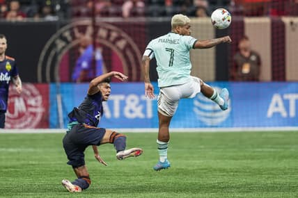 Aug 6, 2022; Atlanta, Georgia, USA; Seattle Sounders defender Xavier Arreaga (3) is able to move the ball past Atlanta United forward Josef Martinez (7) during the second half at Mercedes-Benz Stadium. Mandatory Credit: Dale Zanine-USA TODAY Sports