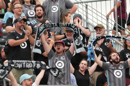 Aug 6, 2022; Commerce City, Colorado, USA; Minnesota United FC fans celebrate after a goal against the Colorado Rapids in the first half at Dick's Sporting Goods Park. Mandatory Credit: Ron Chenoy-USA TODAY Sports