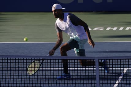 Aug 7, 2022; Washington, DC, USA; Nick Kyrgios (AUS) hits a volley against Yoshihito Nishioka (JPN) (not pictured) in the men's singles final on day seven of the Citi Open at Rock Creek Park Tennis Center. Mandatory Credit: Geoff Burke-USA TODAY Sports