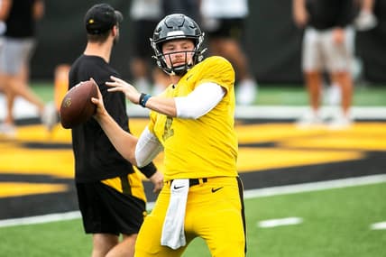 Iowa quarterback Spencer Petras (7) runs a drill during the Kids Day at Kinnick NCAA football practice, Saturday, Aug. 13, 2022, at Kinnick Stadium in Iowa City, Iowa.

220813 Ia Kids Day Fb 023 Jpg