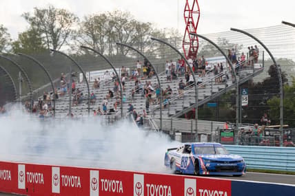 Aug 20, 2022; Watkins Glen, New York, USA; NASCAR Xfinity Series driver Kyle Larson (88) celebrates after winning the Sunoco Go Rewards 200 at Watkins Glen International. Mandatory Credit: Matthew OHaren-USA TODAY Sports