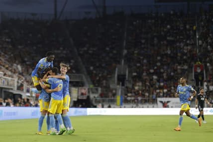 Aug 20, 2022; Washington, District of Columbia, USA; Philadelphia Union forward Mikael Uhre (7) celebrates with teammates after scoring a goal against D.C. United in the first half at Audi Field. Mandatory Credit: Geoff Burke-USA TODAY Sports