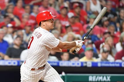 Aug 23, 2022; Philadelphia, Pennsylvania, USA; Philadelphia Phillies catcher J.T. Realmuto (10) hits a two RBI triple against the Cincinnati Reds during the sixth inning at Citizens Bank Park. Mandatory Credit: Eric Hartline-USA TODAY Sports
