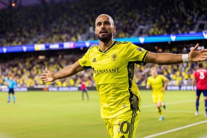 Aug 21, 2022; Nashville, Tennessee, USA;  Nashville SC midfielder Hany Mukhtar (10) celebrates after scoring an early goal in the match against FC Dallas at Geodis Park. Mandatory Credit: Casey Gower-USA TODAY Sports