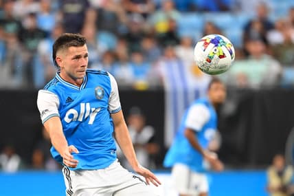 Aug 21, 2022; Charlotte, North Carolina, USA; Charlotte FC midfielder Brandt Bronico (13) with the ball in the first half at Bank of America Stadium. Mandatory Credit: Bob Donnan-USA TODAY Sports