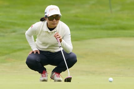 June 13, 2021; Daly City, California, USA; Ayako Uehara lines up her putt on the second hole during the final round of the LPGA MEDIHEAL Championship golf tournament at Lake Merced Golf Club. Mandatory Credit: Kyle Terada-USA TODAY Sports