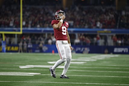 Dec 31, 2021; Arlington, Texas, USA; Alabama Crimson Tide quarterback Bryce Young (9) reacts after throwing a touchdown in the fourth quarter against the Cincinnati Bearcats during the 2021 Cotton Bowl college football CFP national semifinal game at AT&T Stadium. Mandatory Credit: Tim Heitman-USA TODAY Sports