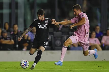 May 14, 2022; Fort Lauderdale, Florida, USA; D.C. United forward Taxiarchis Fountas (11) controls the ball against Inter Miami CF defender Christopher McVey (4) during the second half at DRV PNK Stadium. Mandatory Credit: Sam Navarro-USA TODAY Sports
