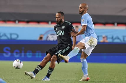 Aug 17, 2022; Harrison, New Jersey, USA; Charlotte FC defender Anton Walkes (5) plays the ball against New York City FC forward Heber (9) during the second half at Red Bull Arena. Mandatory Credit: Vincent Carchietta-USA TODAY Sports