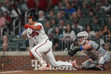 Aug 18, 2022; Cumberland, Georgia, USA; Atlanta Braves second baseman Vaughn Grissom (18) hits an infield single against the New York Mets during the seventh inning at Truist Park. Mandatory Credit: Dale Zanine-USA TODAY Sports