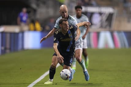 Aug 31, 2022; Chester, Pennsylvania, USA; Philadelphia Union midfielder Daniel Gazdag (6) controls the ball against Atlanta United defender Andrew Gutman (15) in the first half at Subaru Park. Mandatory Credit: Mitchell Leff-USA TODAY Sports