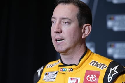 Sep 1, 2022; Charlotte, NC, USA; NASCAR Cup Series driver Kyle Busch (18) talks with the media during the NASCAR Cup Series Playoff Media Day at Charlotte Convention Center. Mandatory Credit: Jim Dedmon-USA TODAY Sports