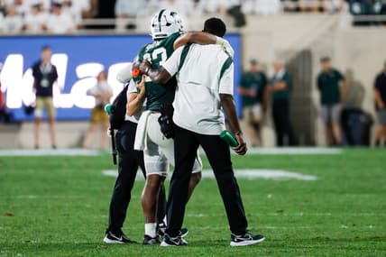 Michigan State linebacker Darius Snow (23) is carried off the field during the first half against Western Michigan at Spartan Stadium in East Lansing on Friday, Sept. 2, 2022.