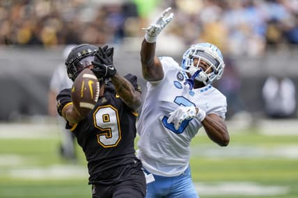 Sep 3, 2022; Boone, North Carolina, USA;Appalachian State Mountaineers wide receiver Christian Wells (9) cannot catch a pass while defended by North Carolina Tar Heels defensive back Storm Duck (3) during the first quarter at Kidd Brewer Stadium. Mandatory Credit: Jim Dedmon-USA TODAY Sports