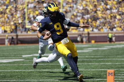 Sep 3, 2022; Ann Arbor, Michigan, USA;  Michigan Wolverines quarterback J.J. McCarthy (9) rushes for a touchdown in the second half against the Colorado State Rams at Michigan Stadium. Mandatory Credit: Rick Osentoski-USA TODAY Sports