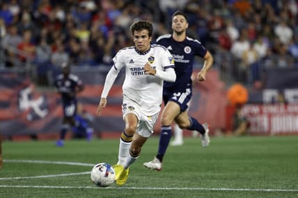 Aug 28, 2022; Foxborough, Massachusetts, USA; Los Angeles Galaxy midfielder Rayan Raveloson (6) during the first half against the New England Revolution at Gillette Stadium. Mandatory Credit: Winslow Townson-USA TODAY Sports
