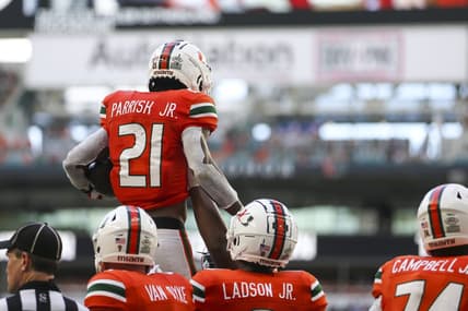 Sep 3, 2022; Miami Gardens, Florida, USA; Miami Hurricanes running back Henry Parrish Jr. (21) celebrates with teammates after scoring during the second quarter against the Bethune Cookman Wildcats at Hard Rock Stadium. Mandatory Credit: Sam Navarro-USA TODAY Sports