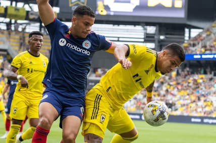 Sep 3, 2022; Columbus, Ohio, USA; Columbus Crew forward Cucho (9) dribbles the ball while Chicago Fire defender Miguel Angel Navarro (6) defends in the first half at Lower.com Field. Mandatory Credit: Trevor Ruszkowski-USA TODAY Sports