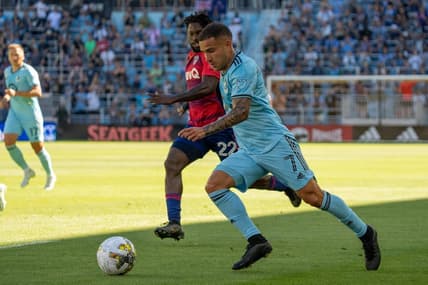 Sep 3, 2022; Saint Paul, Minnesota, USA; Minnesota United midfielder Franco Fragapane (7) is defended by FC Dallas midfielder Ema Twumasi (22) in the first half at Allianz Field. Mandatory Credit: Matt Blewett-USA TODAY Sports
