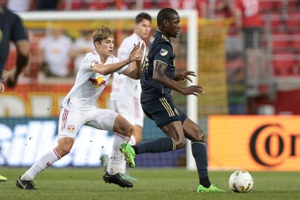 Sep 3, 2022; Harrison, New Jersey, USA; Philadelphia Union defender Nathan Harriel (26) controls the ball against New York Red Bulls midfielder Daniel Edelman (75) during the first half at Red Bull Arena. Mandatory Credit: Vincent Carchietta-USA TODAY Sports
