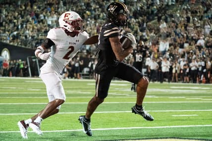 Vanderbilt wide receiver Will Sheppard (14) races past Elon defensive back Tre'Von Jones (2) for a touchdown during the second quarter at FirstBank Stadium Saturday, Sept. 3, 2022, in Nashville, Tenn.

Nas Elon Vanderbilt 017