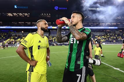 Sep 3, 2022; Nashville, Tennessee, USA; Nashville SC midfielder Hany Mukhtar (10) celebrates his victory with Austin FC forward Sebasti n Driussi (7) after the match at Geodis Park. Mandatory Credit: Casey Gower-USA TODAY Sports