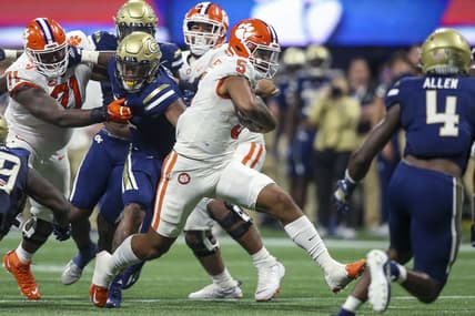 Sep 5, 2022; Atlanta, Georgia, USA; Clemson Tigers quarterback DJ Uiagalelei (5) runs the ball against the Georgia Tech Yellow Jackets in the second quarter at Mercedes-Benz Stadium. Mandatory Credit: Brett Davis-USA TODAY Sports