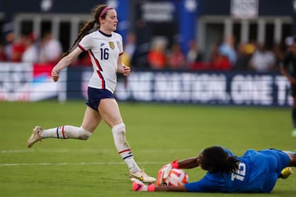 Sep 6, 2022; Washington, District of Columbia, USA; Nigeria goalkeeper Chiamaka Nnadozie (16) makes a save against United States midfielder Rose Lavelle (16) during the first half at Audi Field. Mandatory Credit: Scott Taetsch-USA TODAY Sports