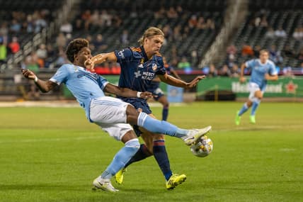 Sep 7, 2022; New York, NY, New York, NY, USA; New York City FC forward Talles Magno (43) crosses the ball defended by FC Cincinnati defender Nick Hagglund (4) during the first half at Citi Field. Mandatory Credit: Mark Smith-USA TODAY Sports