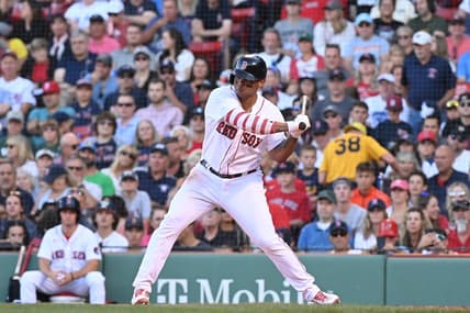 Sep 3, 2022; Boston, Massachusetts, USA; Boston Red Sox third baseman Rafael Devers (11) at bat against the Texas Rangers at Fenway Park. Mandatory Credit: Eric Canha-USA TODAY Sports