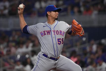 Sep 10, 2022; Miami, Florida, USA; New York Mets starting pitcher Carlos Carrasco (59) delivers a pitch in the first inning against the Miami Marlins at loanDepot park. Mandatory Credit: Jasen Vinlove-USA TODAY Sports