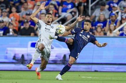 Sep 10, 2022; Cincinnati, Ohio, USA; San Jose Earthquakes Rodrigues (left) battles for the ball against FC Cincinnati forward Brenner (9) in the first half at TQL Stadium. Mandatory Credit: Aaron Doster-USA TODAY Sports