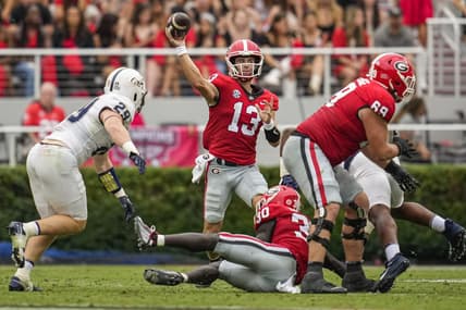 Sep 10, 2022; Athens, Georgia, USA; Georgia Bulldogs quarterback Stetson Bennett (13) passes against the Samford Bulldogs during the second half at Sanford Stadium. Mandatory Credit: Dale Zanine-USA TODAY Sports