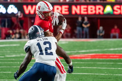 Sep 10, 2022; Lincoln, Nebraska, USA; Nebraska Cornhuskers wide receiver Marcus Washington (7) catches a pass against Georgia Southern Eagles defensive back Anthony Wilson (12) during the second quarter at Memorial Stadium. Mandatory Credit: Dylan Widger-USA TODAY Sports
