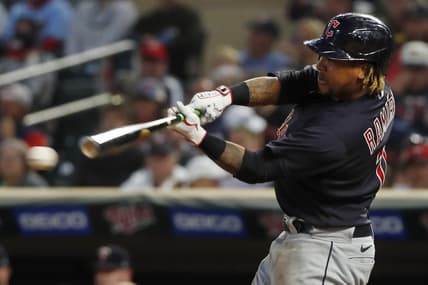 Sep 10, 2022; Minneapolis, Minnesota, USA; Cleveland Guardians third baseman Jose Ramirez (11) hits an RBI single against the Minnesota Twins in the fourth inning at Target Field. Mandatory Credit: Bruce Kluckhohn-USA TODAY Sports