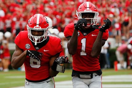 Georgia running back Kenny McIntosh (6) celebrates with Georgia wide receiver Marcus Rosemy-Jacksaint (1) after scoring touchdown during the first half of a college football game between Samford and Georgia in Athens, Ga., on Saturday, Sept. 10, 2022.

Syndication Online Athens