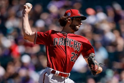 Sep 11, 2022; Denver, Colorado, USA; Arizona Diamondbacks starting pitcher Zac Gallen (23) pitches in the first inning against the Colorado Rockies at Coors Field. Mandatory Credit: Isaiah J. Downing-USA TODAY Sports