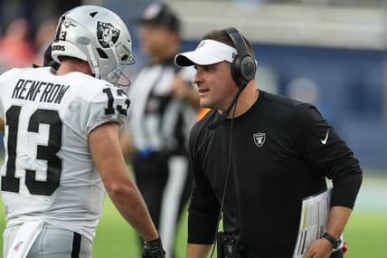 Sep 11, 2022; Inglewood, California, USA; Las Vegas Raiders coach Josh McDaniels (right) and wide receiver Hunter Renfrow (13) react in the second half against the Los Angeles Chargers at SoFi Stadium. Mandatory Credit: Kirby Lee-USA TODAY Sports