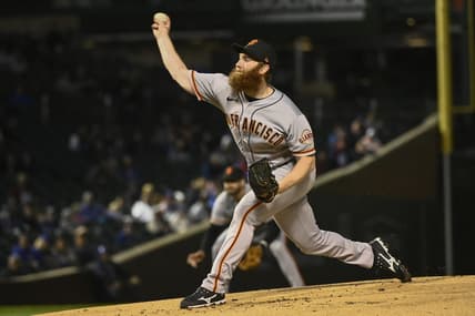 Sep 11, 2022; Chicago, Illinois, USA;  San Francisco Giants starting  pitcher John Brebbia (59) delivers against the Chicago Cubs during the first inning at Wrigley Field. Mandatory Credit: Matt Marton-USA TODAY Sports