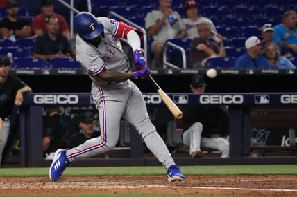 Sep 12, 2022; Miami, Florida, USA; Texas Rangers right fielder Adolis Garcia (53) doubles in the seventh inning against the Miami Marlins at loanDepot park. Mandatory Credit: Jasen Vinlove-USA TODAY Sports