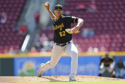 Sep 13, 2022; Cincinnati, Ohio, USA; Pittsburgh Pirates starting pitcher Johan Oviedo (62) pitches against the Cincinnati Reds in the first inning at Great American Ball Park. Mandatory Credit: Katie Stratman-USA TODAY Sports
